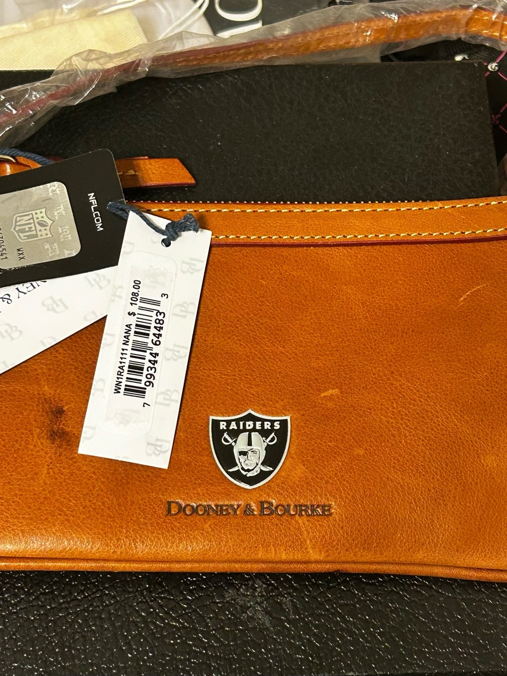 Dooney & Bourke Saddle Brown Leather Raiders Crest Wristlet